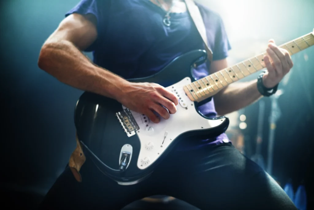 Musician playing guitar